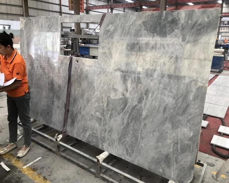 Himalayan Gray Marble island with cutout sink